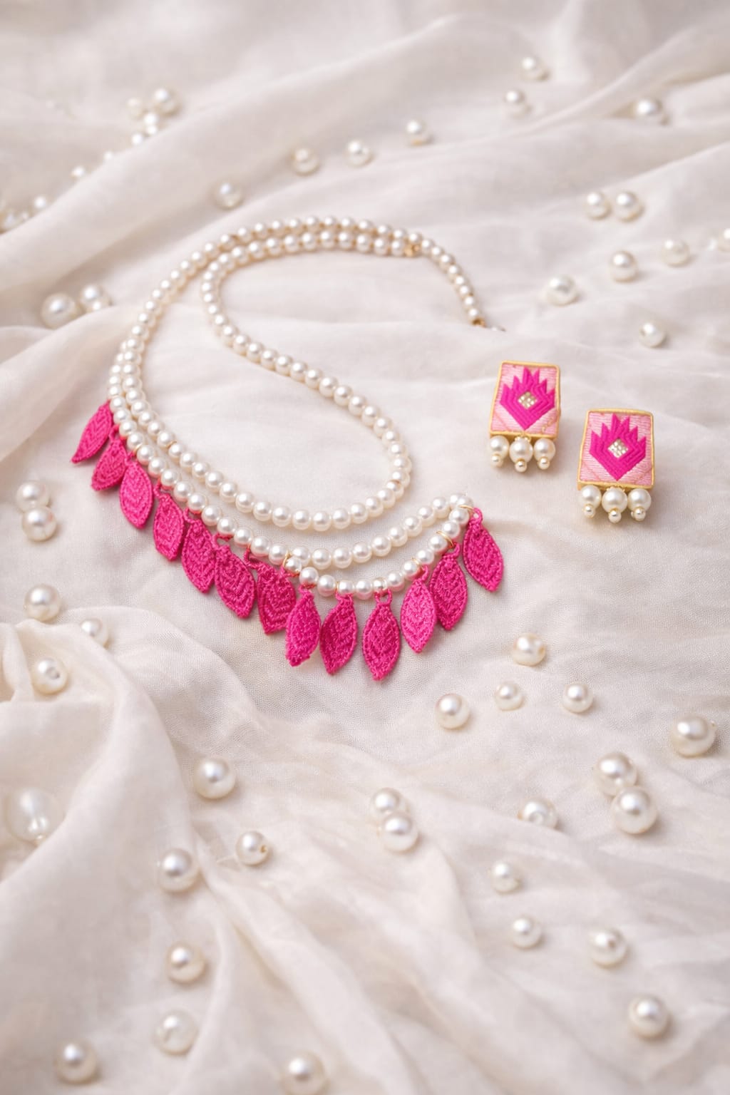 venucian handcrafted pearl set made of assam silk fabric